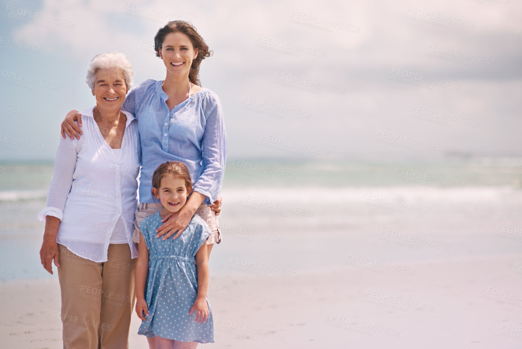 Buy stock photo Portrait, smile and family generations on beach in summer together for travel, holiday or vacation. Senior mother, woman parent and girl child bonding on sand by sea or ocean for tropical getaway