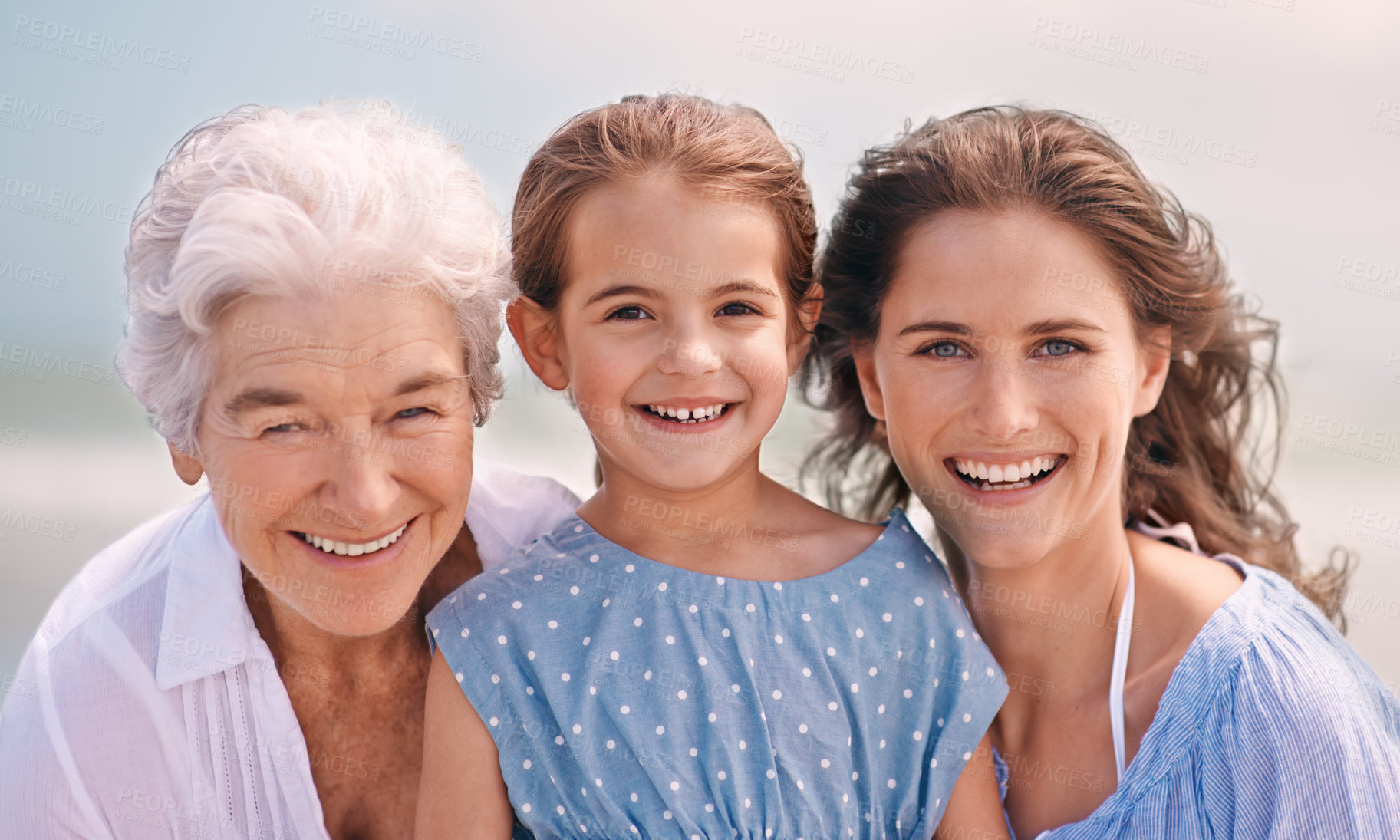 Buy stock photo Portrait, love and family generations on beach in summer together for travel, holiday or vacation. Face of senior mother, woman parent and girl child bonding on sand by sea or ocean for getaway