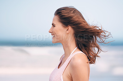 Buy stock photo Woman, wind and smile on beach environment for holiday destination or travel journey, happiness or blue sky. Female person, relax and seaside in Florida for outdoor paradise, fresh air or adventure