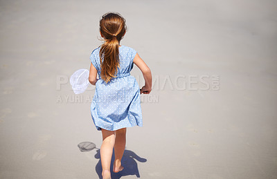 Buy stock photo Child, outdoor and running with fishing net or nature explore in summer or vacation adventure, travel or rear view. Female person, kid and sand in Florida for holiday destination, health or mockup
