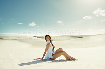 Buy stock photo Portrait, fashion and woman with vacation, sand and weekend break with dune, relax and getaway trip. Blue sky, person and girl with holiday and pose with adventure and outdoor with nature and desert