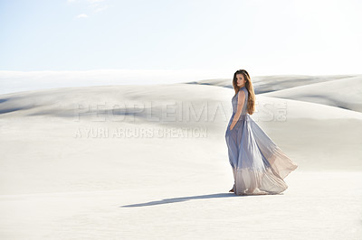 Buy stock photo Fashion, dress of woman in the desert and wind isolated around sand. Travel or freedom, holiday or vacation and female person and portrait of goddess on adventure with mockup space outdoor in summer