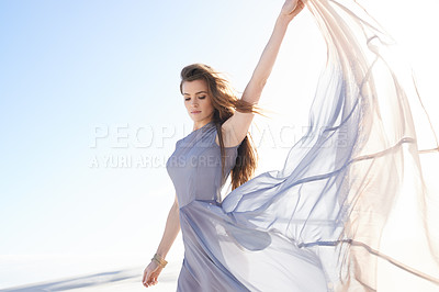Buy stock photo Shot of a beautiful young woman on the beach