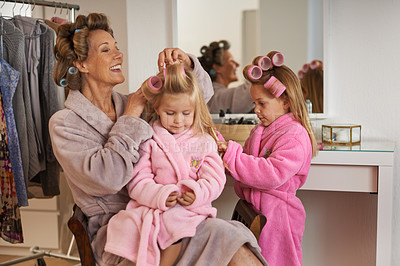 Buy stock photo Hairstyle, home and grandmother with girls, fun and holiday with vacation and grooming. Family, dress up and granny with grandchildren or playing with joy and relaxing with equipment or weekend break
