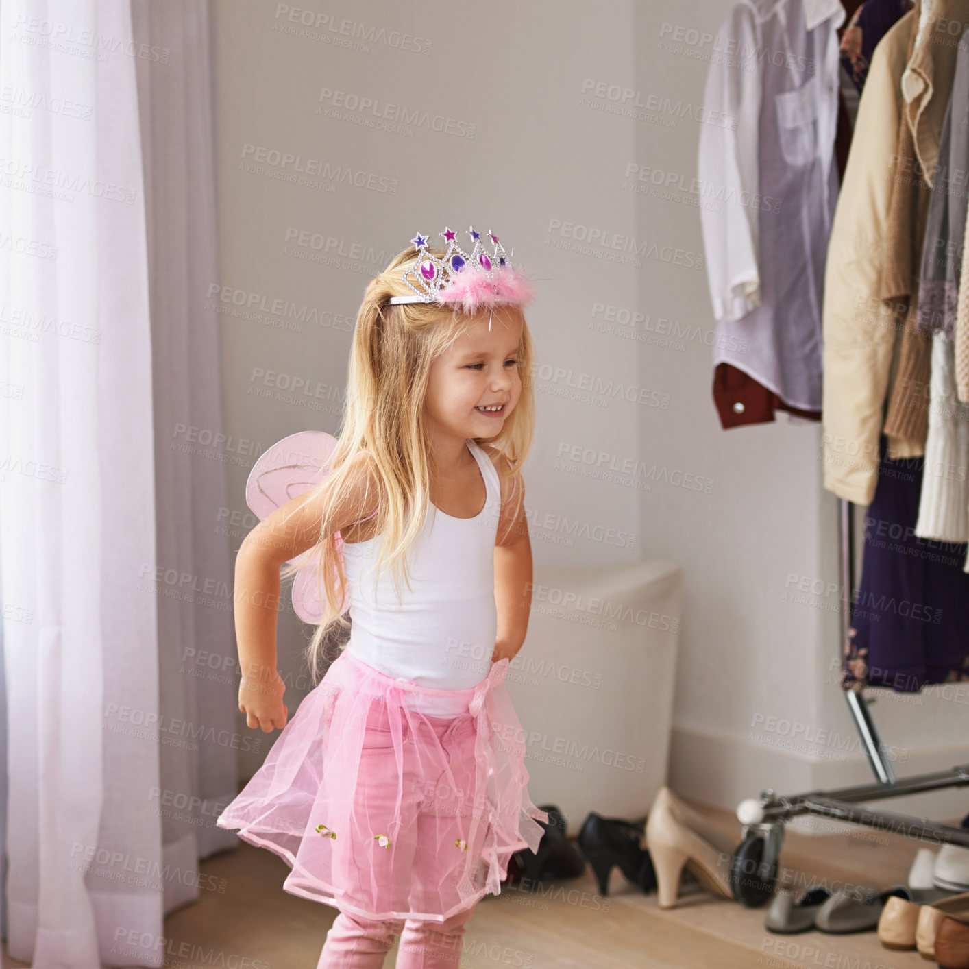 Buy stock photo Princess, dance and portrait of girl with costume in home for fun, play or pretend for happy kids game. Fantasy, fashion and child in creative fairy fancy dress with wings, tiara and smile in bedroom