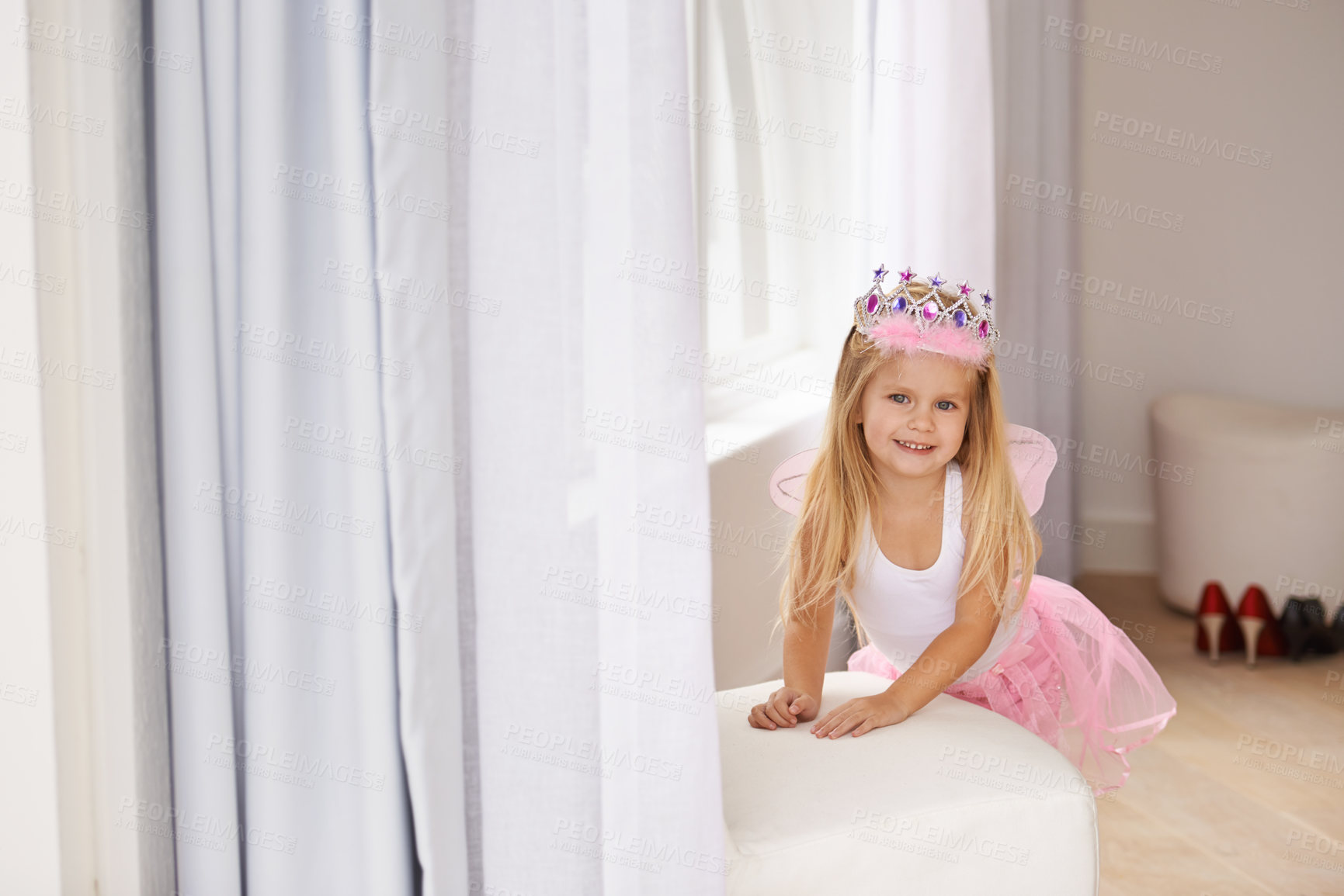 Buy stock photo Princess, costume and portrait of girl in home for fun, playing and pretend for happy kids game. Fantasy, fashion and child in creative fairy fancy dress with wings, tiara and smile in bedroom.