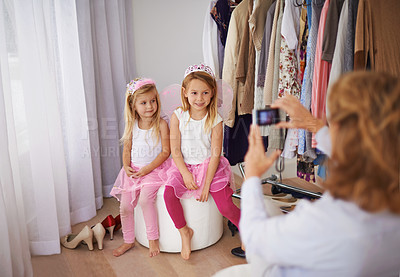 Buy stock photo Children, fairy and costume with cellphone picture or social media post for dress up event, connection or memory. Girls, crowns and smile for smartphone photography for online network, fun or bonding