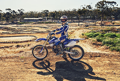 Buy stock photo Man, motorbike and outdoor on trail for portrait with helmet on dirt, path and countryside in summer. Person, motorcycle and gravel on road with vehicle, machine and fast transport in competition