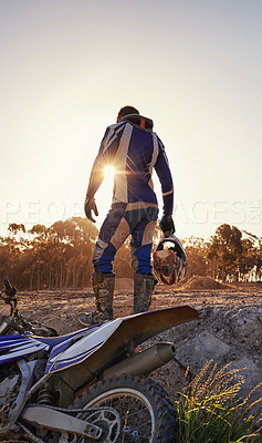 Buy stock photo Motorcycle, sports and danger with back view of biker person outdoor, sunlight with uniform for riding on dirt track. Speed, power and risk with motorbike, transportation and adventure for adrenaline