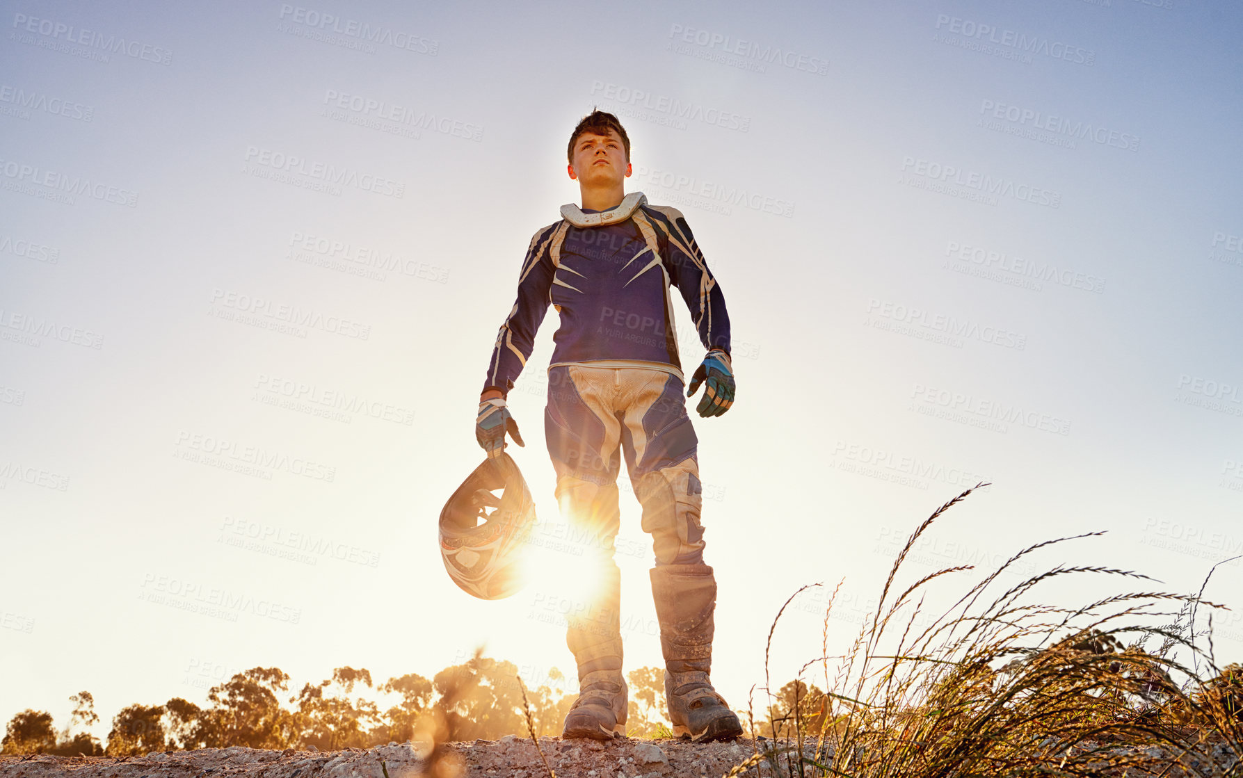 Buy stock photo Man, motocross and rider of extreme sport in nature, confident and danger for adrenaline adventure with speed. Athlete, pride or gear for motorcycle action off road or skill in driving a fast vehicle