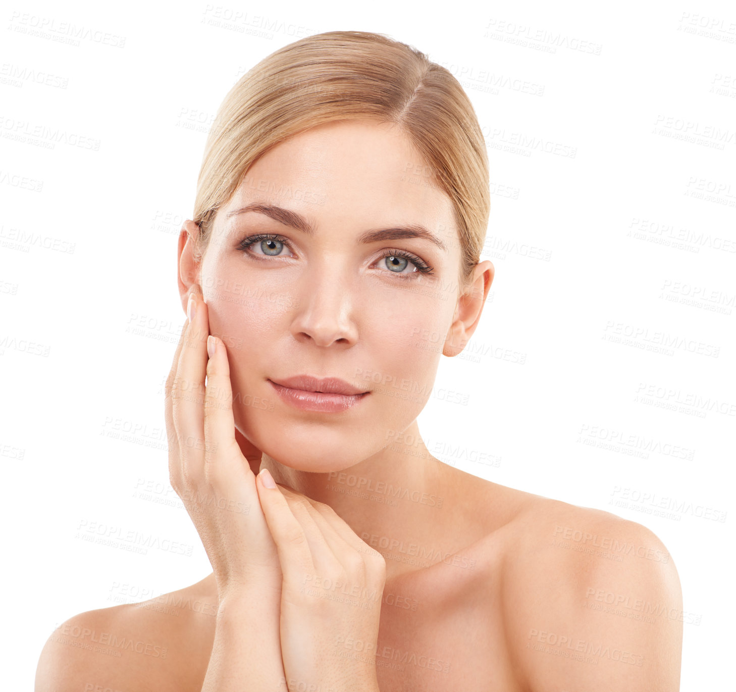 Buy stock photo Cropped studio shot of a beautiful woman touching her face