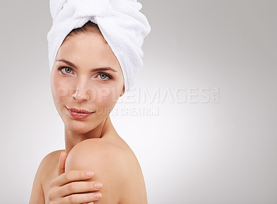 Buy stock photo Beauty, skincare and portrait of woman with towel, natural glow and mockup space in studio. Dermatology, healthy skin and girl on white background with luxury facial, morning routine and cosmetics.