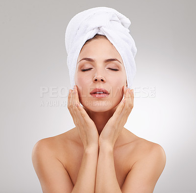 Buy stock photo Beauty, cosmetics and face of woman with towel, natural glow and getting ready in studio. Dermatology, healthy skin and girl on white background with luxury facial, morning routine and skincare.
