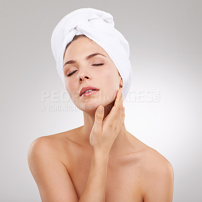 Buy stock photo Skincare, cosmetics and face of woman with towel, natural glow and getting ready in studio. Dermatology, healthy skin and girl on white background with luxury facial, morning routine and beauty.