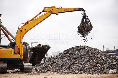 Buy stock photo Crane, vehicle and junkyard for moving metal with sustainability, manufacturing or stop pollution. Machine, tractor and outdoor in scrapyard, plant or ecology for iron, steel industry and environment