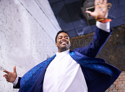 Buy stock photo Happy, dance and black man at club with music, energy and movement in celebration at night. African, person and expression of creativity, rhythm and joy from show of talent for salsa choreography
