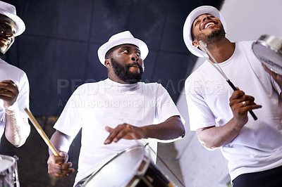 Buy stock photo Band, drums or carnival with a happy people playing an instrument in a festival in Rio de Janeiro. Brazil, show or group of musician, performer or artist banging on a drum to create a beat in party