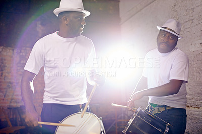 Buy stock photo Night, drum or men in band for carnival playing an instrument in festival in Rio de Janeiro, Brazil. Black people, show or group of male artists banging to create a beat in party or music performance