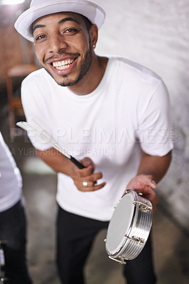 Buy stock photo Happy, man and music on drums for carnival, festival or performance with band at party. Night, club and musician smile in portrait with instrument for playing creative samba or salsa beat with rhythm