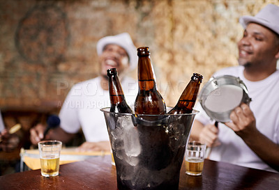 Buy stock photo Musician, band and group with drink, men and happy for drums, performance and party with alcohol. Friends, artist and singing with bottle, beer and relax in pub for social event in Rio de Janeiro