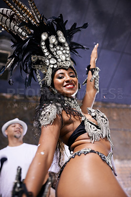 Buy stock photo Dancer, carnival and girl in portrait with confidence, pride or culture in low angle for music performance in night. Person, woman and stage at event, party and smile at celebration in Rio de Janeiro