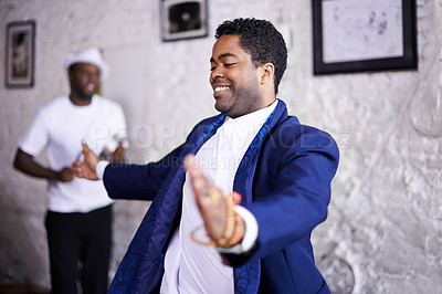 Buy stock photo Happy, dance and black man at event with music, band and samba in celebration of culture in Brazil. Drums, musician and person moving with creative performance at party and joy from salsa or talent