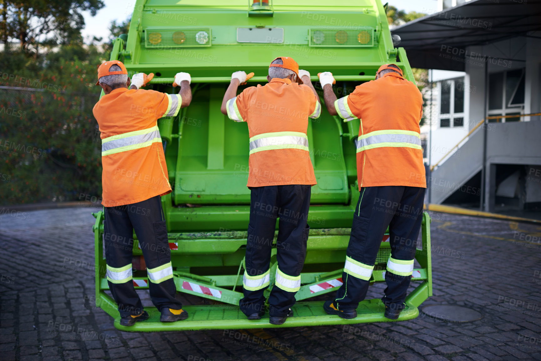 Buy stock photo Men, garbage truck and waste collection service for city pollution for cleaning, environment or teamwork. Male people, back and dirt transportation for sidewalk debris in New York, mess or litter