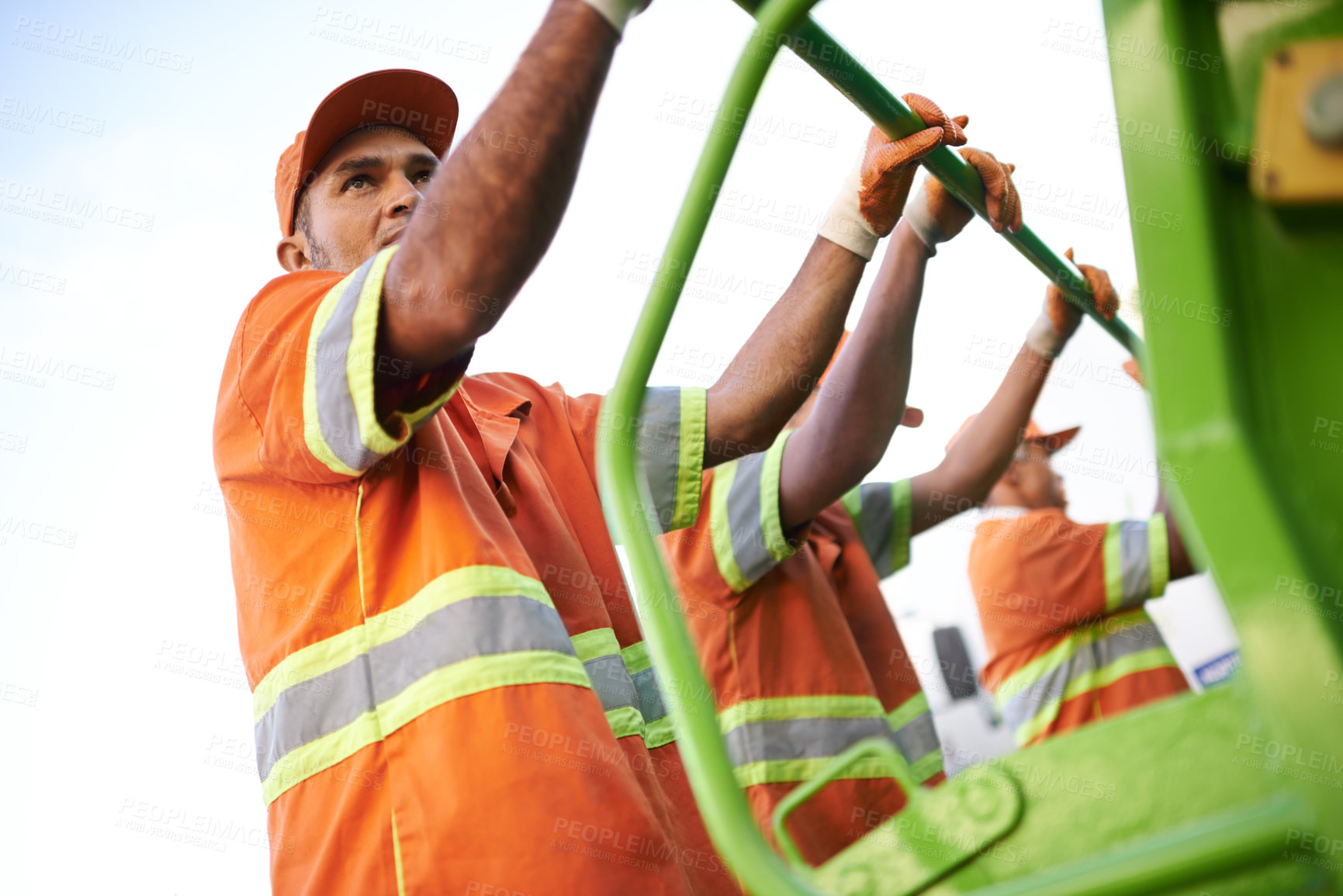 Buy stock photo Industry, waste management and garbage truck with men in uniform cleaning outdoor on city street. Job, service and male people working with rubbish for sanitation, maintenance or collection of dirt.