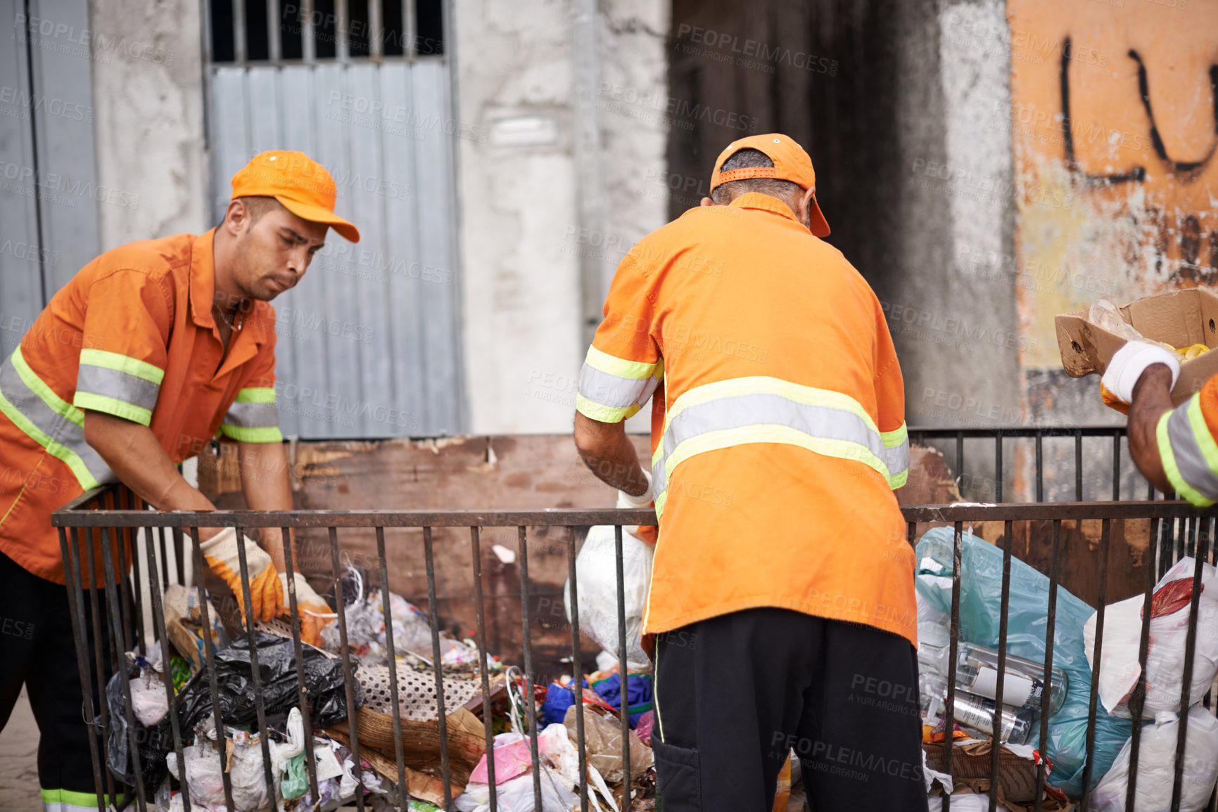 Buy stock photo Waste, people and workers for municipal cleaning garbage on streets of urban city.  Employees, service and orange uniform for job of trash collection, bags and plastic pollution in environment