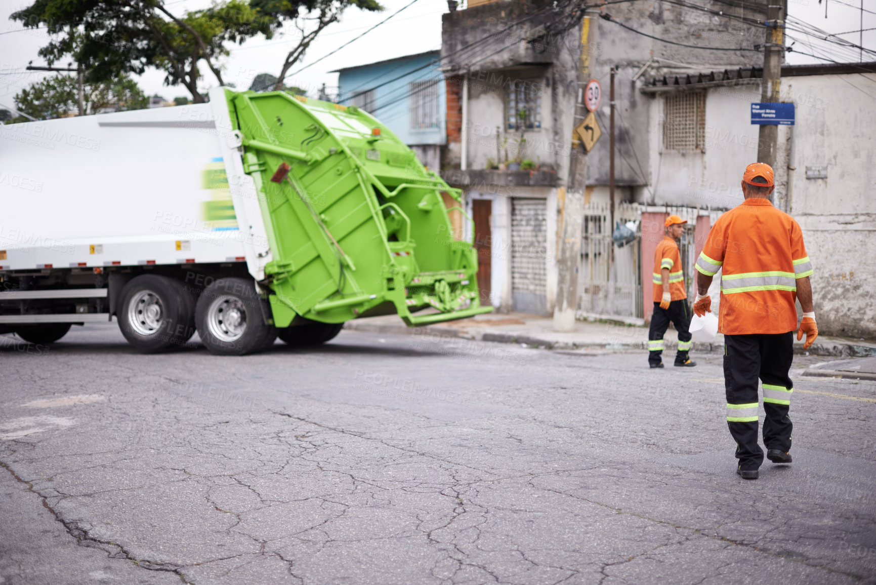 Buy stock photo Teamwork, truck and garbage collection for cleaning and disposal in waste management or trash. Dumpster refuse, cleanup by sanitation workers for rubbish removal and environmental sustainability