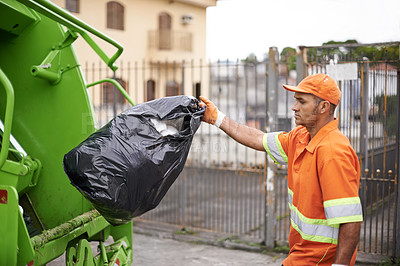 Buy stock photo Cleaning, waste management and garbage truck with man in uniform throwing black bag outdoor on city street. Job, service and trash with serious person working for sanitation or collection of dirt