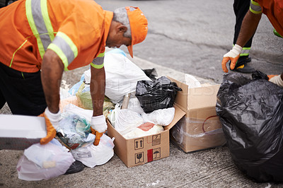 Buy stock photo Men, garbage and trash collection on street for waste management in city, pollution and recycling plastic. Team, uniform and sanitation service with rubbish, boxes or cleaning junk for maintenance