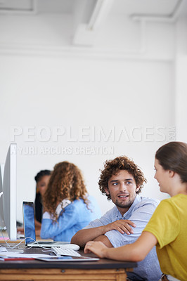 Buy stock photo Teamwork, talking or creative people planning in startup for a research project in office desk together. Collaboration, smile or young woman helping or speaking of design ideas on notes or paperwork 