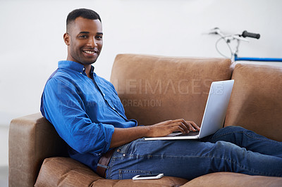 Buy stock photo Man, laptop and online for remote work in portrait, freelancer and copywriting in living room. Black male person, home and plan on tech or connection for website, information and research for article