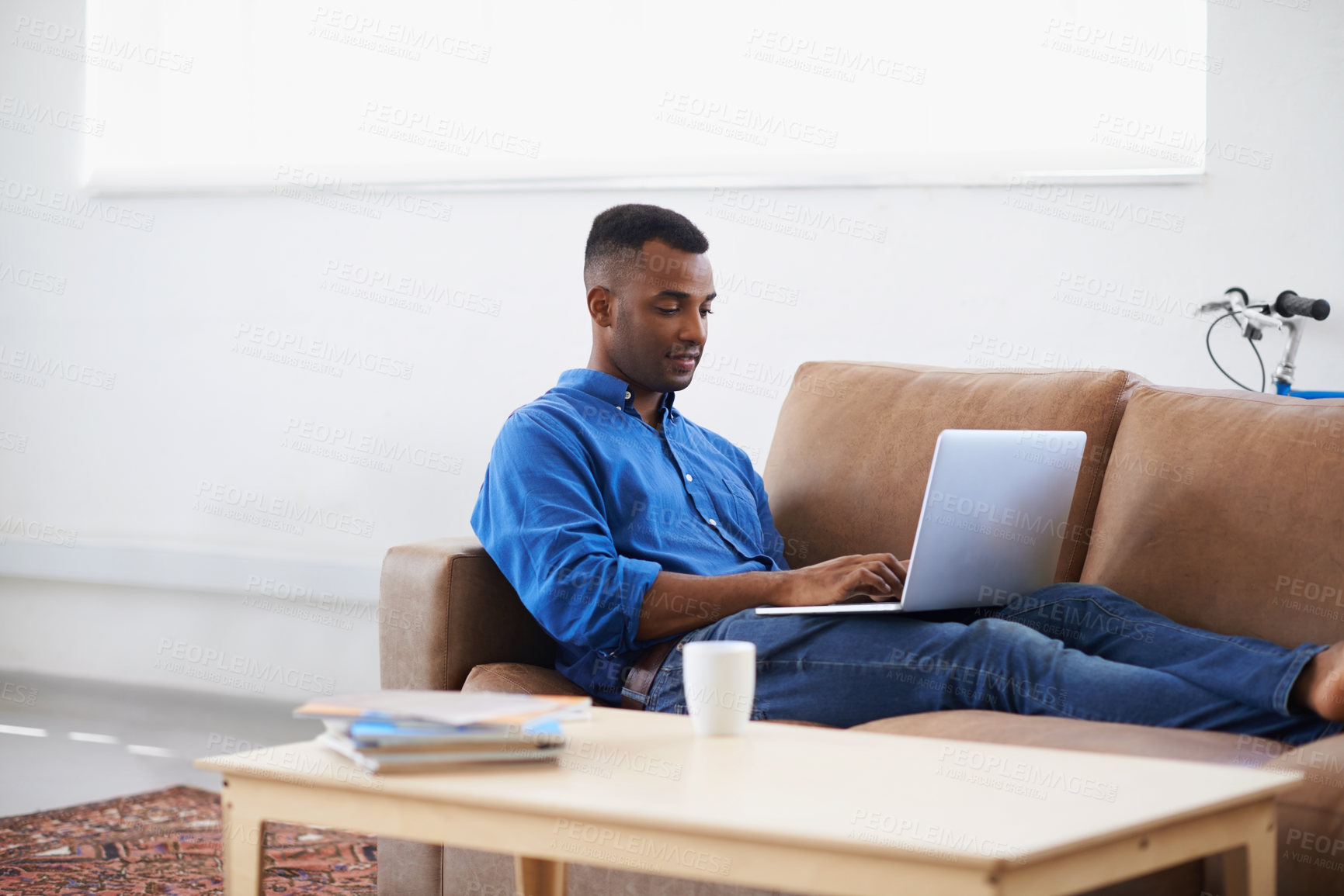 Buy stock photo Man, laptop and internet for remote work at home, freelancer and copywriting in living room. Black male person, online and plan on tech or connection for website, information and research for article