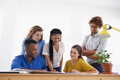 Buy stock photo Diversity, business people and documents in team strategy for planning, brainstorming or design at the office. Group of diverse employees working on paperwork in teamwork collaboration at workplace