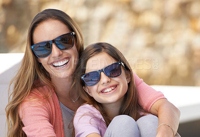 Buy stock photo Portrait of a mother and daughter spending time together in the outdoors