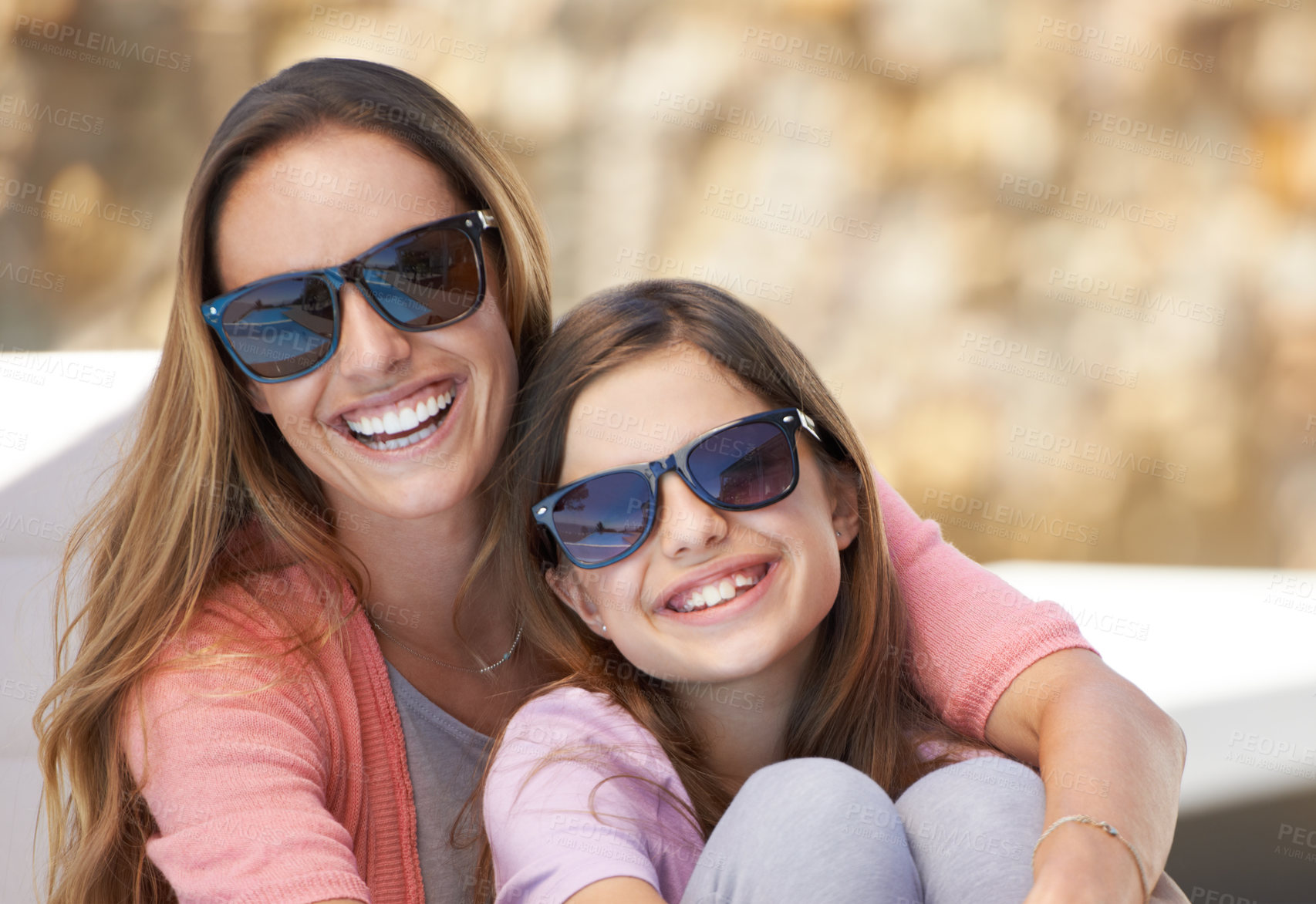 Buy stock photo Portrait of a mother and daughter spending time together in the outdoors