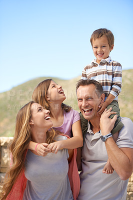 Buy stock photo Mother, father and children or nature portrait together or holiday bonding for adventure, travel or vacation. Parents, siblings and shoulders for summer sunshine in Florida garden, connection or trip