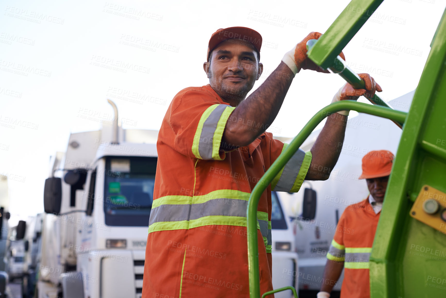 Buy stock photo Cropped shot of a team of garbage collectors