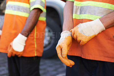 Buy stock photo Cropped shot of a team of garbage collectors 