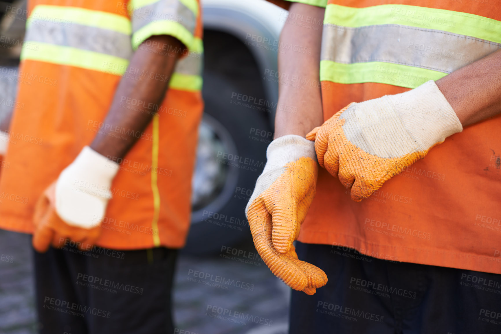 Buy stock photo Cropped shot of a team of garbage collectors 