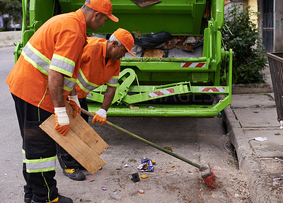 Buy stock photo Cropped shot of a team of garbage collectors