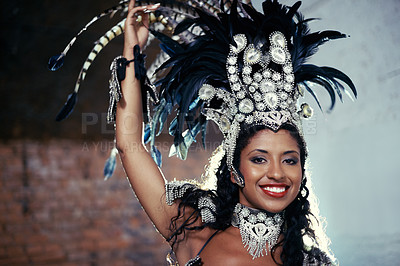Buy stock photo Portrait, samba dancer and black woman with headdress for carnival, festival or parade on urban background in Rio de Janeiro. Brazilian performer, female person and closeup in costume for performance