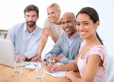Buy stock photo Shot of smiling business people in a business meeting