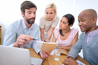 Buy stock photo Team, notebook and business people listening to leader, brainstorming or mentor training interns in startup. Group, coaching and employees in collaboration, planning or creative designers in meeting