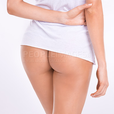 Buy stock photo Cropped studio shot of a woman's bum