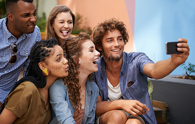 Buy stock photo Crazy, face and group of friends for selfie at university campus for profile picture update or social media post. Men, women and happy students with technology for memory, diversity and college fun