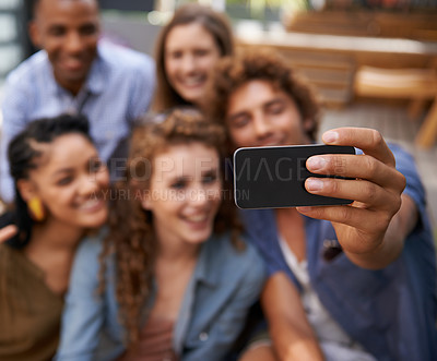 Buy stock photo Hand, friends and group or smile for selfie at university campus for profile picture update or social media post. Men, women and happy students with technology for memory, diversity and college fun 