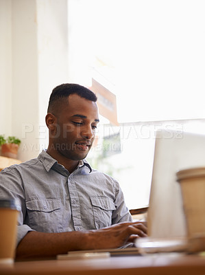 Buy stock photo Businessman, laptop or typing email in cafe for communication, networking or research for remote work. Entrepreneur, african person or technology with writing, freelancer or business project in diner